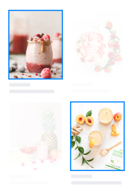 A tw-grid layout displays four images, with the two most prominent images highlighted by blue borders. The top-left image features a smoothie, while the bottom-right image shows citrus fruits.
